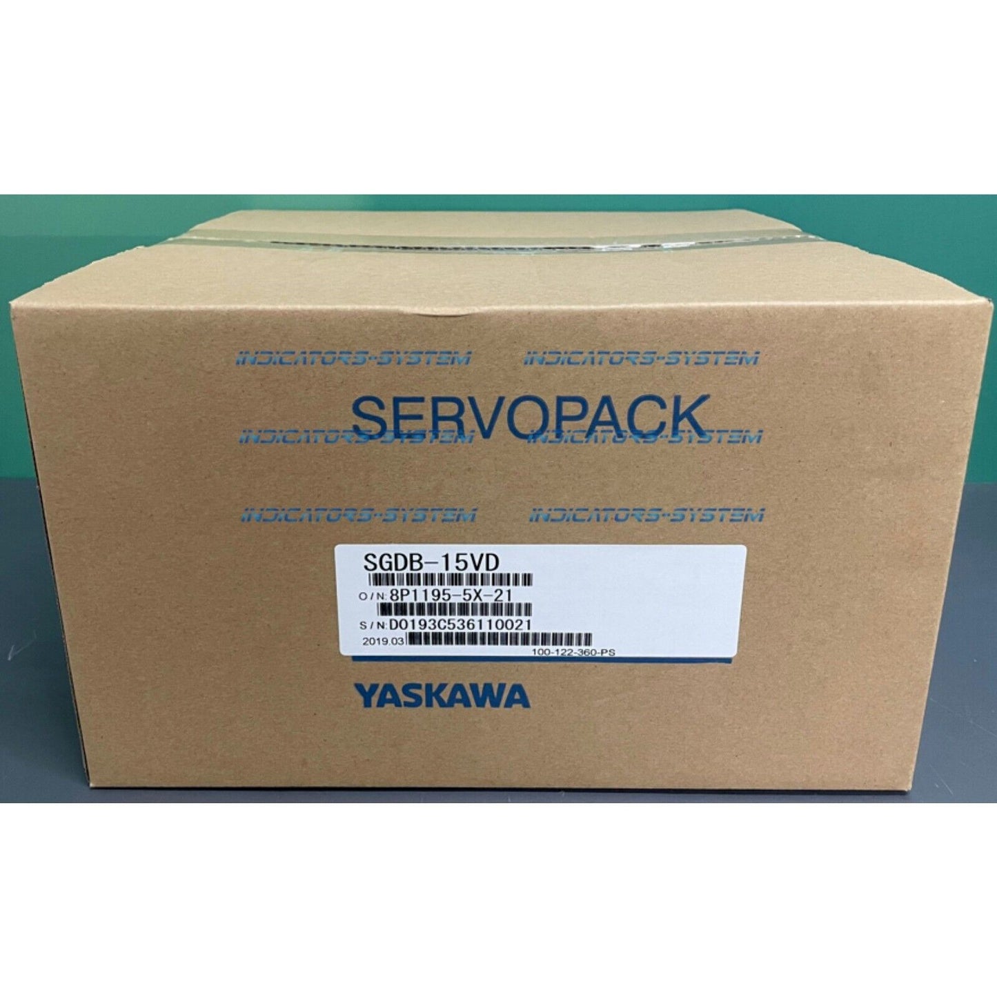 Yaskawa SGDB-15VD Servo Drive box. Brown cardboard with SERVOPACK and YASKAWA labels. Industrial automation part.