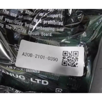 FANUC A20B-2101-0390 Control Board, packaged and labeled for protection.