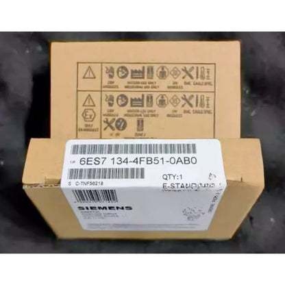 Siemens 6ES7 134-4FB51-0AB0 DP Electronics Module in original packaging, industrial automation part.