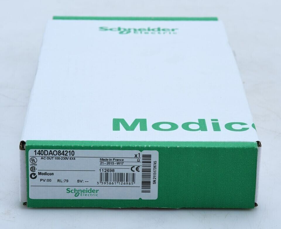 Schneider Electric Modicon Quantum 140DAO84210 PLC module box, green and white, featuring product details and brand logo.