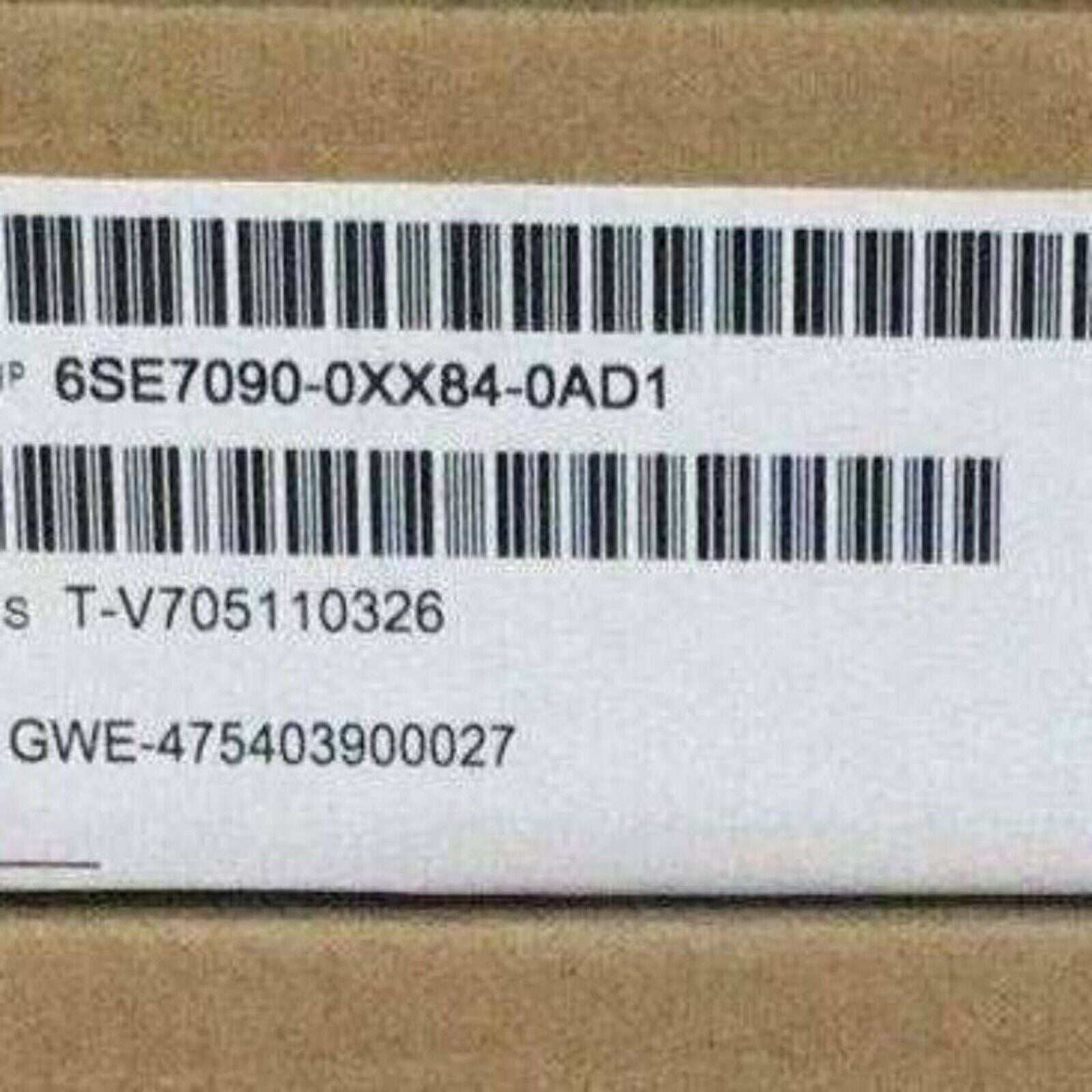 Siemens 6SE7090-0XX84-0AD1 product label with barcode, serial number, and model details.