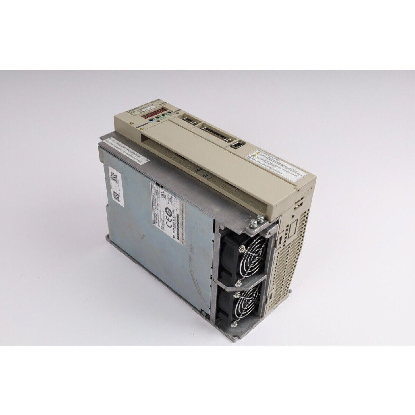 YASKAWA SGDH-20DE-OY servo drive, metal and beige casing with two cooling fans, product details visible.