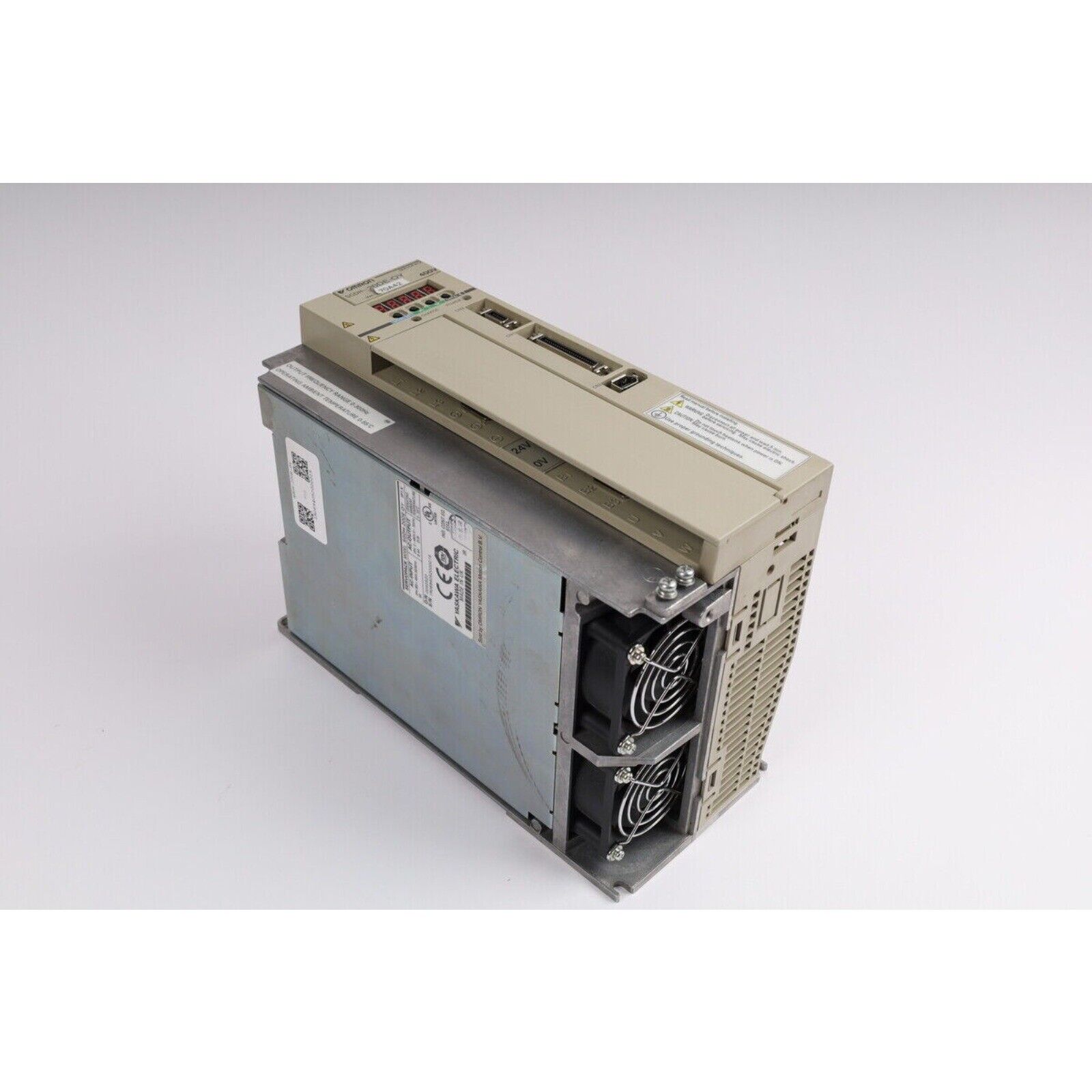 YASKAWA SGDH-20DE-OY servo drive, metal and beige casing with two cooling fans, product details visible.