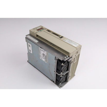 YASKAWA SGDH-20DE-OY servo drive, metal and beige casing with two cooling fans, product details visible.