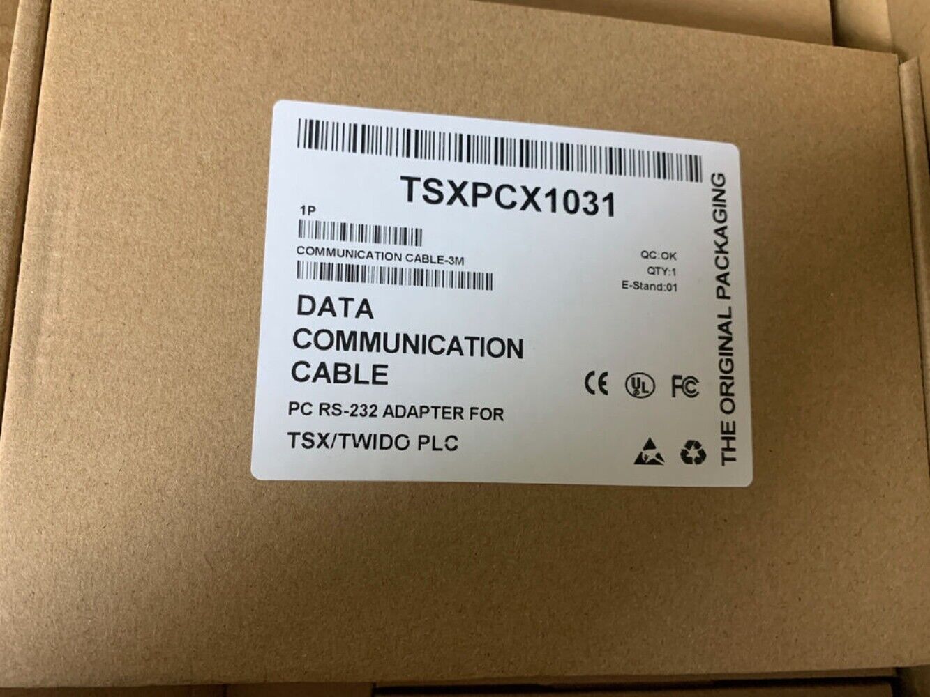 TSXPCX1031 PLC Data Communication Cable in packaging, RS-232 adapter for TSX/Twido PLC.