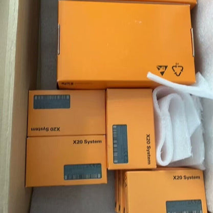 B&R X20 System I/O Modules in orange boxes, new, for industrial automation.