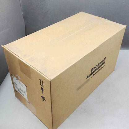 Allen-Bradley PowerFlex 70 AC Drive in a brown cardboard box, labeled Rockwell Automation.