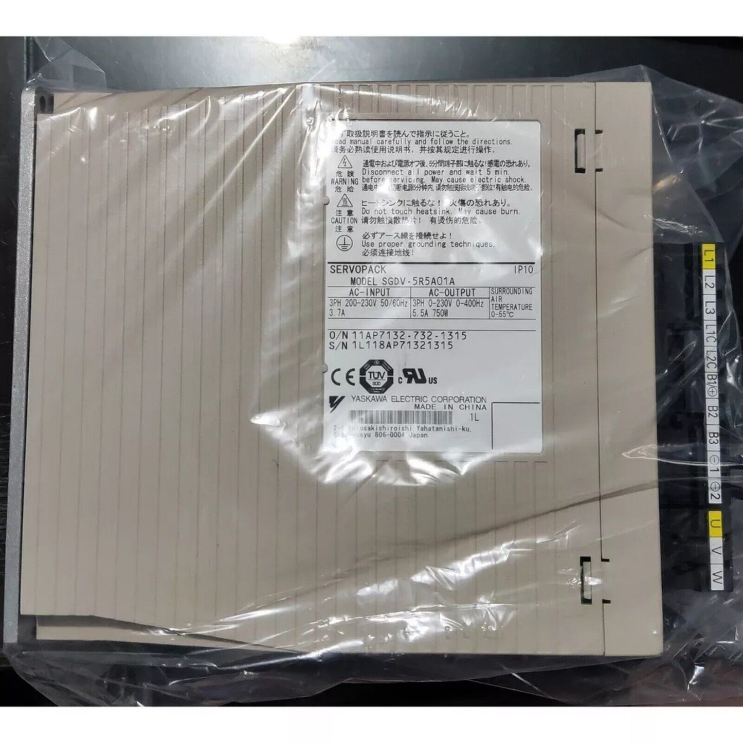 Yaskawa SGDV-5R5A01A Servo Drive in box, industrial automation part. Made in China.