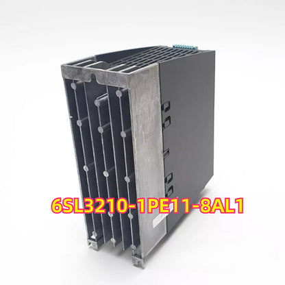 Siemens SINAMICS G120C frequency inverter 6SL3210-1PE11-8AL1, industrial component, gray and metallic, cooling fins.