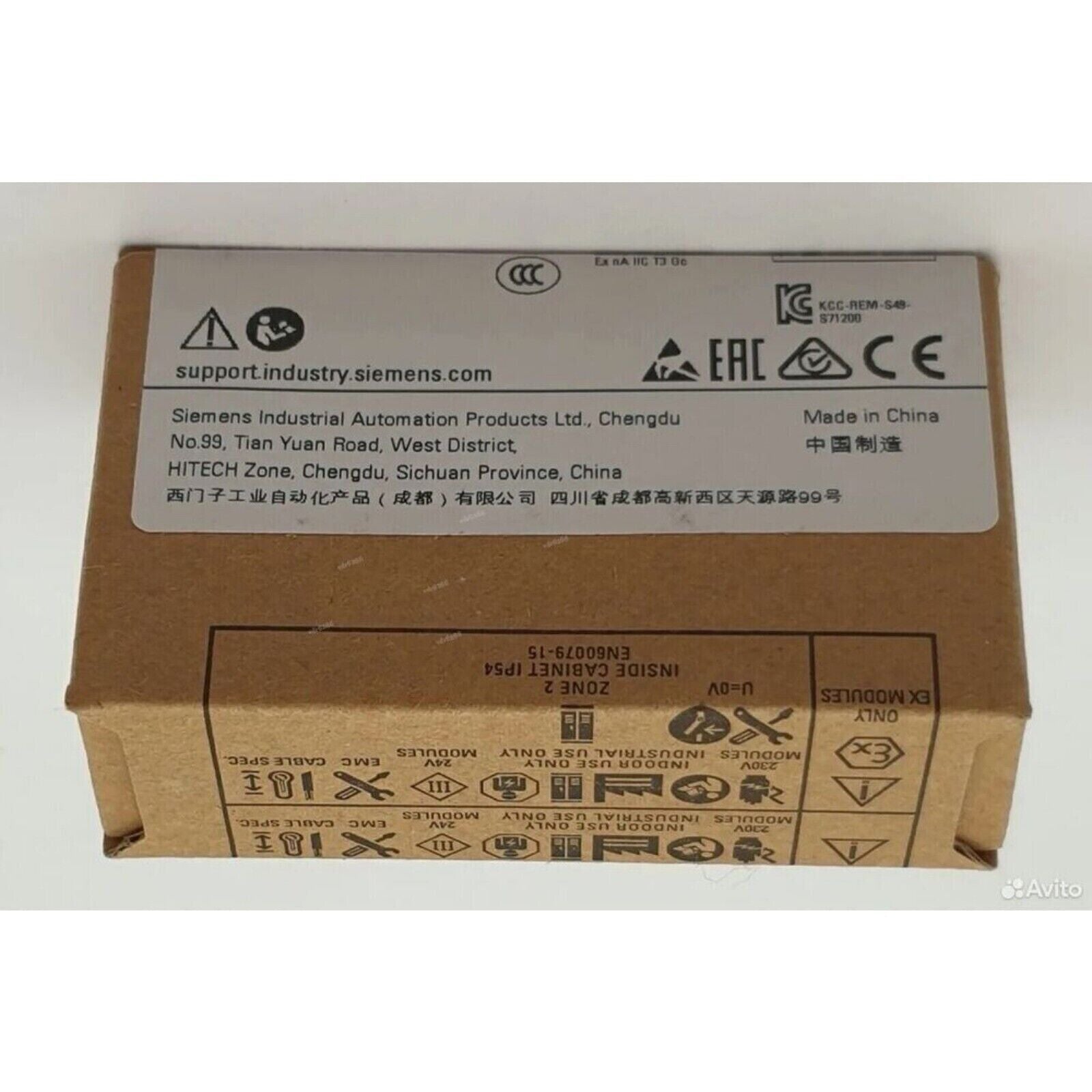 Siemens SIMATIC S7-1200 module box, featuring address and certification details, for industrial automation.