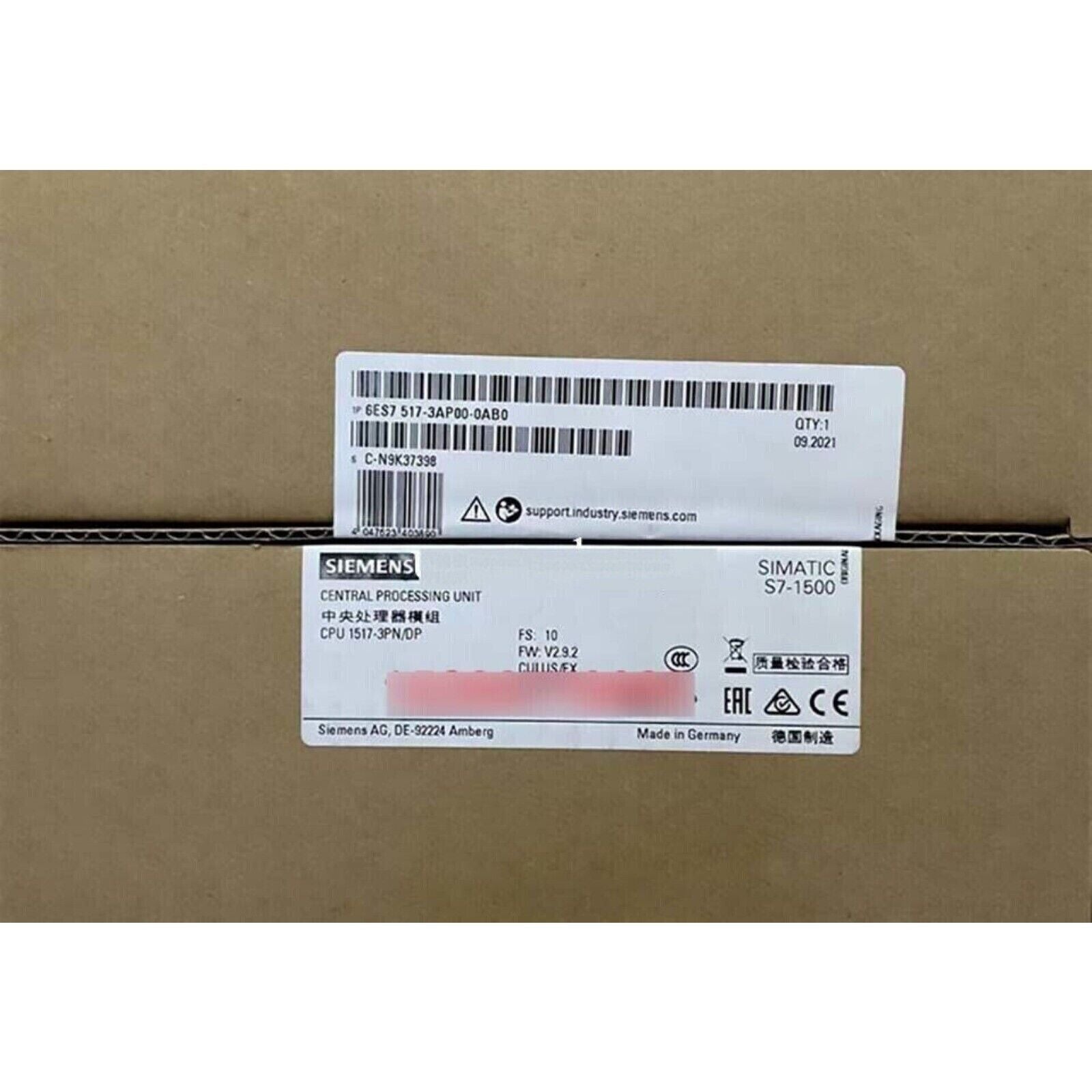 Siemens S7-1500 CPU 1517-3PN/DP product box, labels with product details and codes visible.