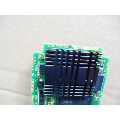FANUC A20B-3300-0313 board, industrial automation component, green and black circuit board, PLC module.