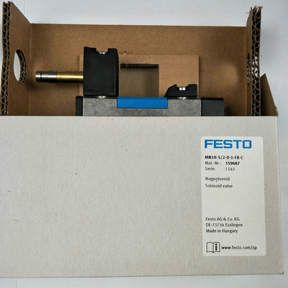 Festo MN1H-5/2-D-1-FR-C solenoid valve in box, industrial automation part, with product information label.