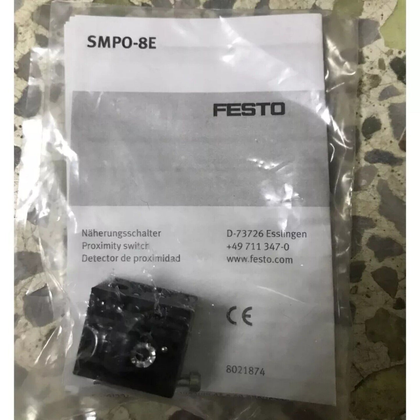 Festo SMPO-8E Proximity Sensor. Industrial automation component, CE marking, black color.
