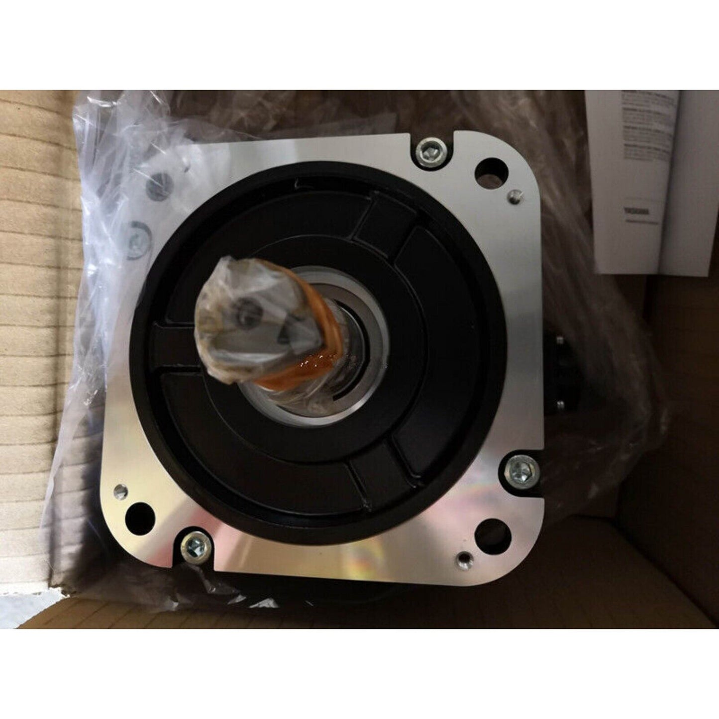 Yaskawa SGM7G-13AFC61 servo motor, new in box. Black industrial automation part for sale, expedited shipping available.
