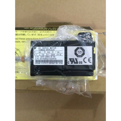 YASKAWA AC Servo Motor SGMAS-A5ACA41, new in packaging, labels visible, industrial automation part