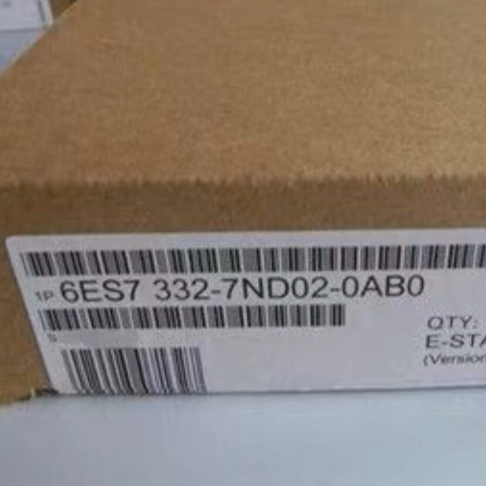 SIMATIC S7-300 6ES7 332-7ND02-0AB0 analog output module packaging, brown box, product label.
