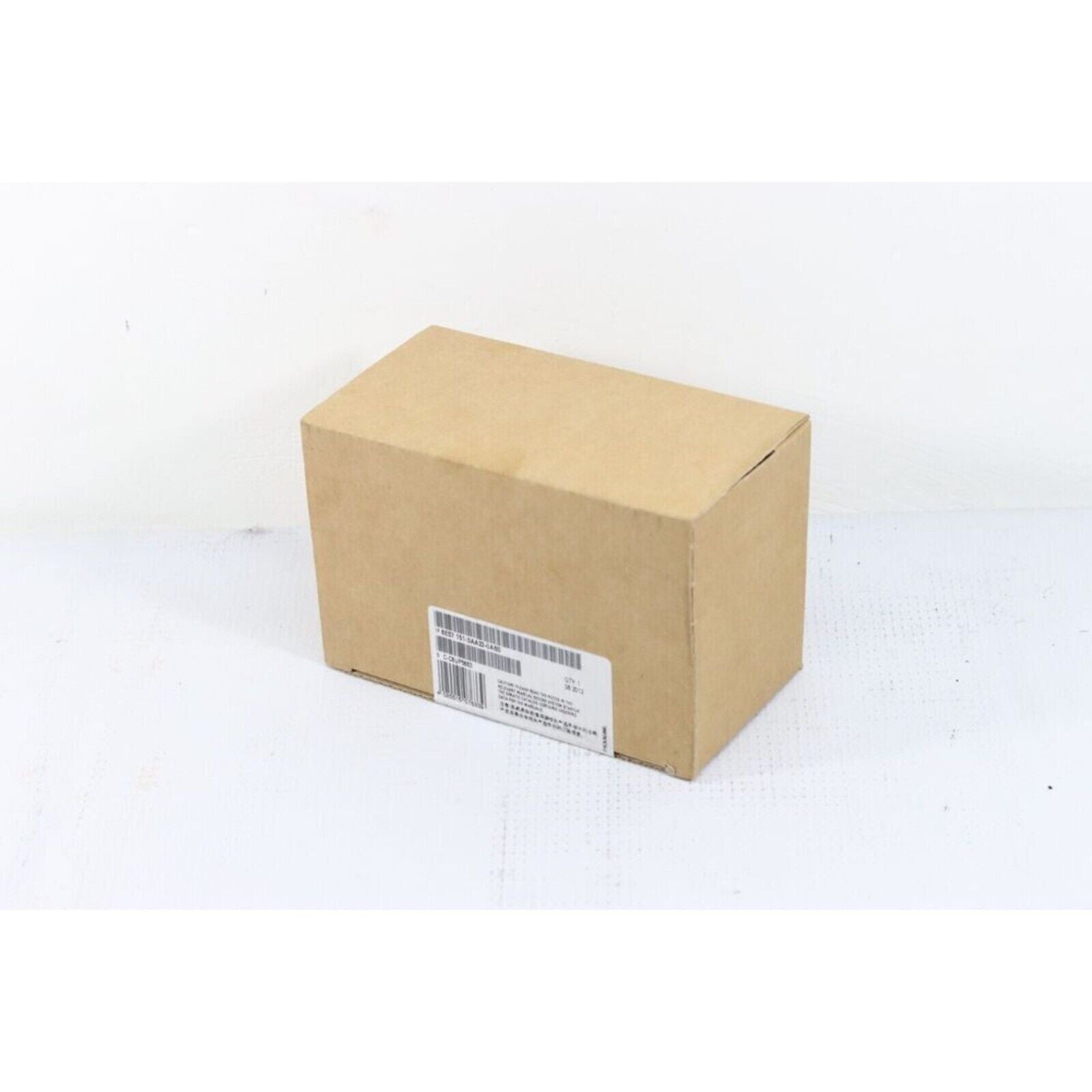 Siemens 6ES7151-3AA23-0AB0 SIMATIC S7-1500 DP interface module product box. Industrial automation part packaging.