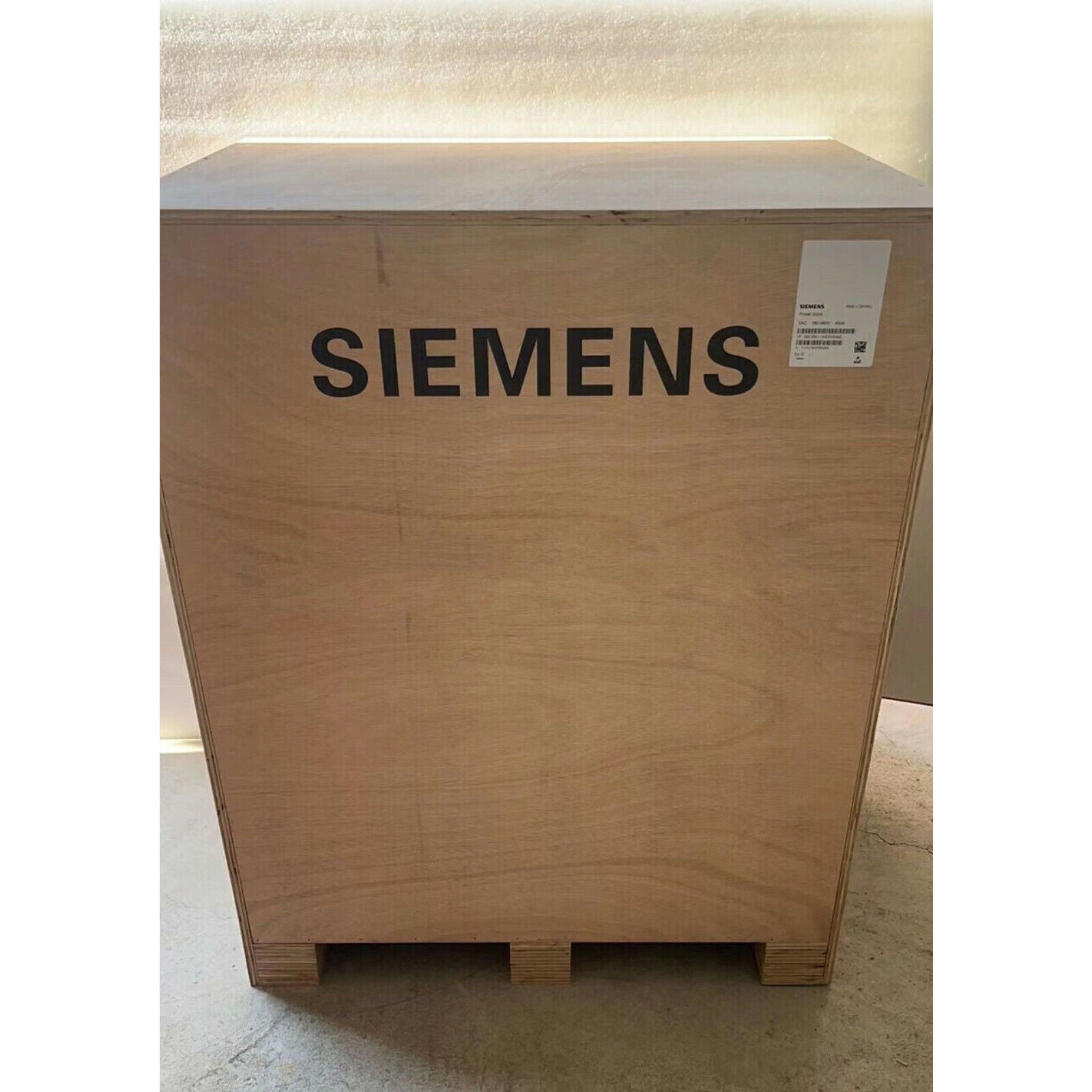 Siemens equipment shipping crate. New PLC module 6SL3330-7TE33-8AA3 inside. Industrial automation parts.