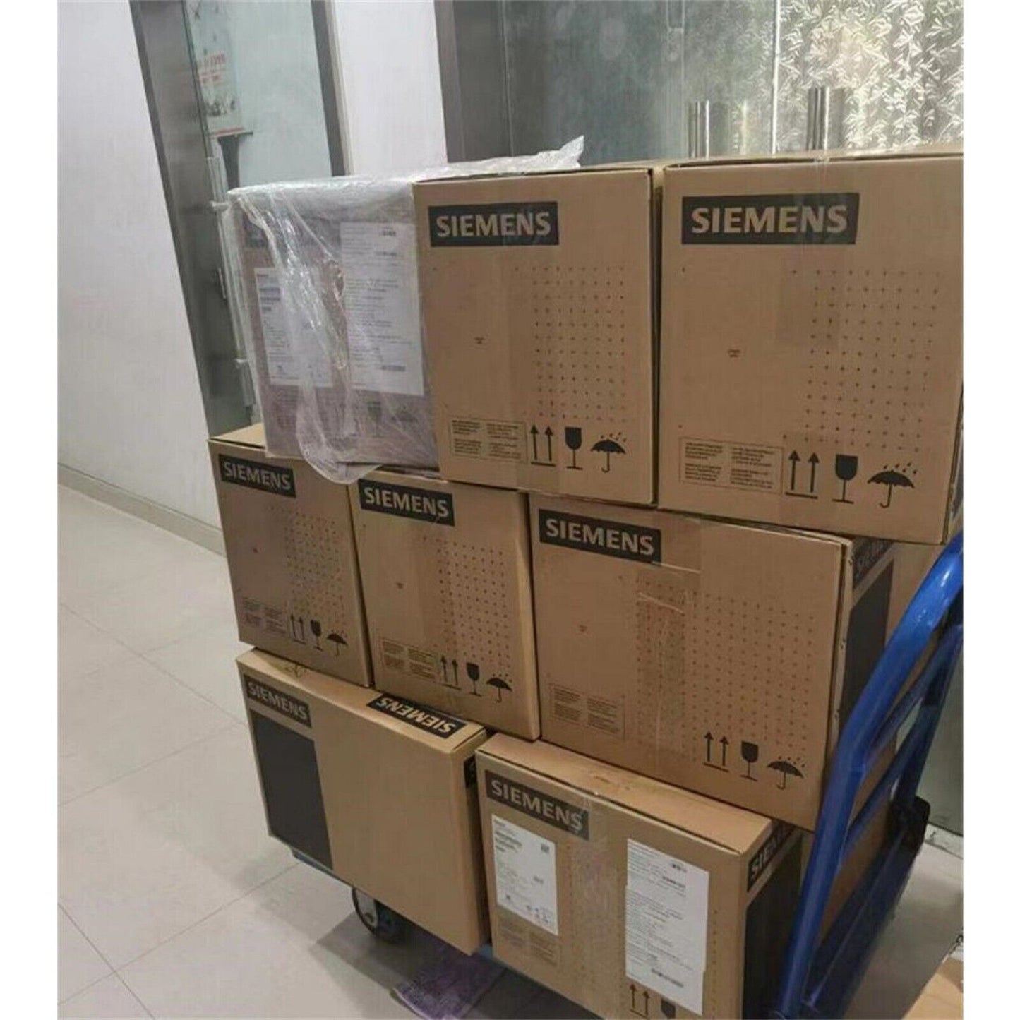 Stacked Siemens SINAMICS G120C Power Module boxes, industrial automation parts