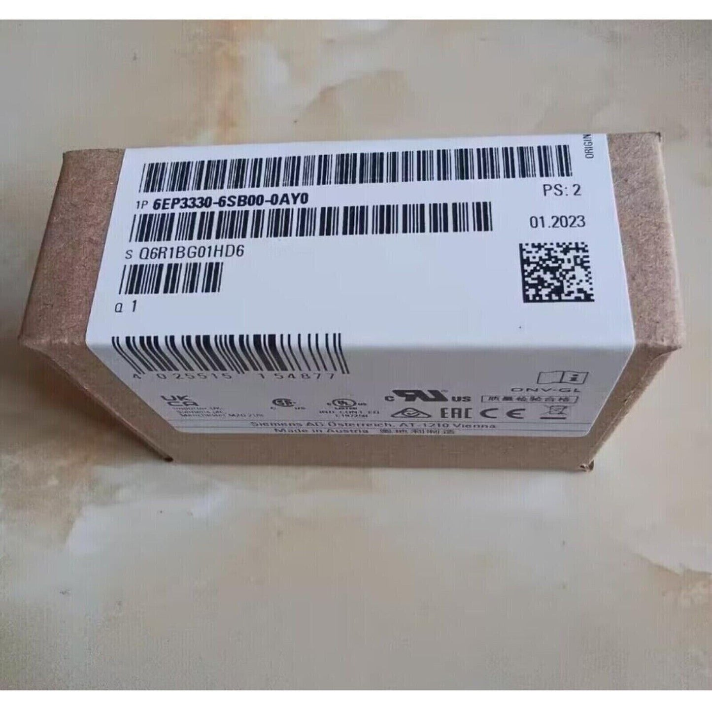 Siemens 6EP3330-6SB00-0AY0 Power Supply Box, industrial automation component, label details visible.