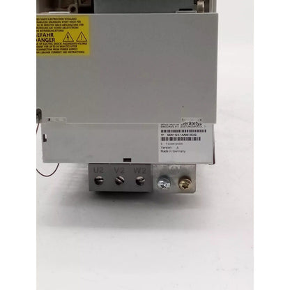 Siemens SIMODRIVE 611 power module, 6SN1123-1AA00-0EA2, gray metal casing with warning labels, industrial automation part.