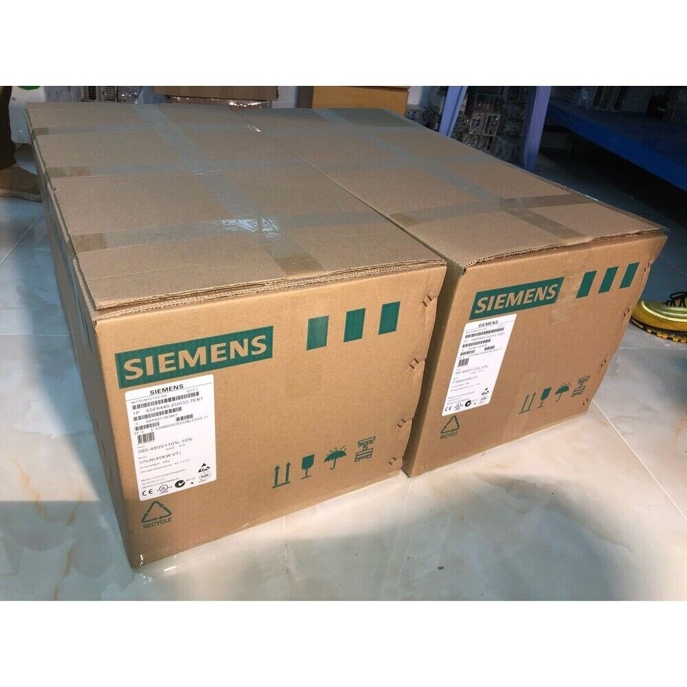Siemens MICROMASTER 440 frequency converter boxes, model 6SE6440-2UD33-7EB1, industrial automation parts. Boxes with labels. 