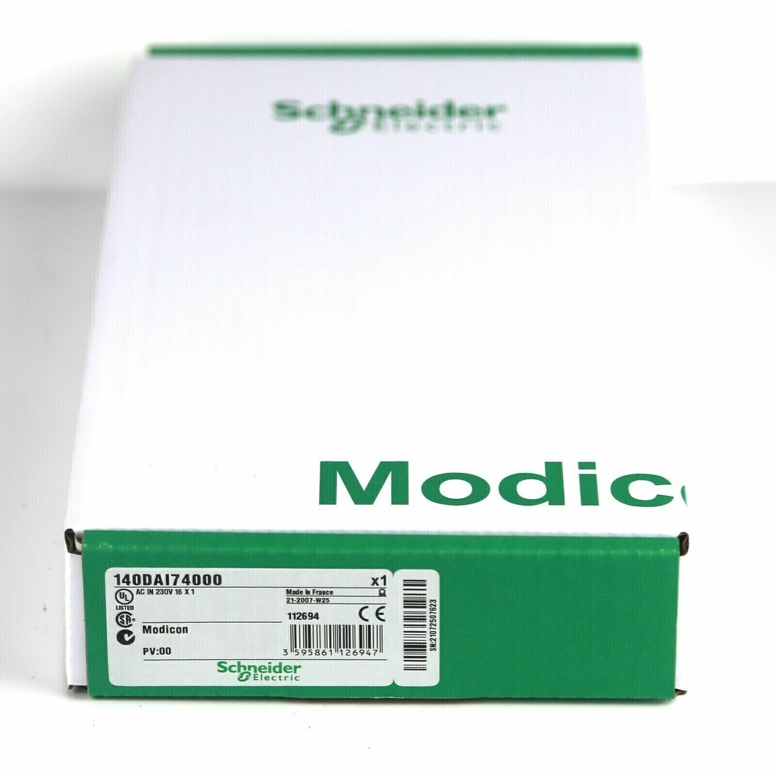 Schneider Electric 140DAI74000 PLC Input Module box, green and white packaging, industrial automation part.