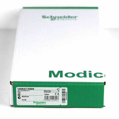 Schneider Electric 140DAI74000 PLC Input Module box, green and white packaging, industrial automation part.
