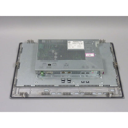 Siemens SIMATIC MP377 touch panel 6AV6 644-0BA01-2AX1, industrial automation part, metal casing, ports, and labels.