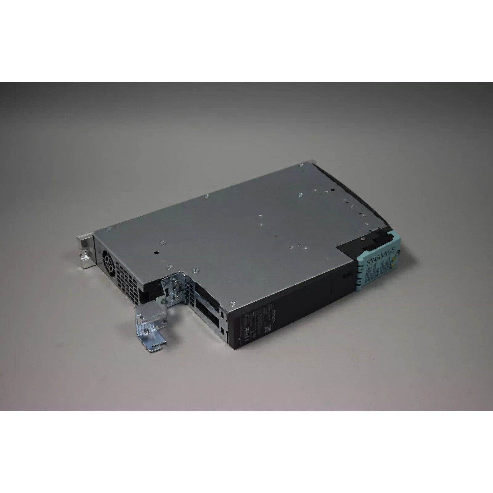 Siemens SINAMICS S120 PM240-2 power module, industrial drive system component. Grey metal housing.