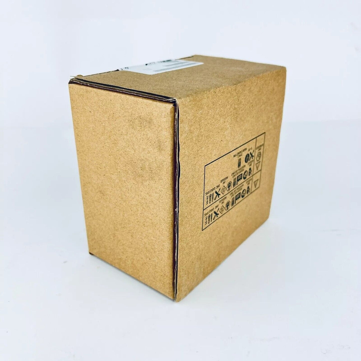 Siemens SIMATIC DP CPU 1512SP F-1 PN PLC Module in brown box with labels, industrial automation part.