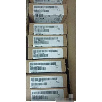 Siemens ET 200SP Analog Output Modules in boxes. Model 6ES7135-6FB00-0BA1, industrial automation parts.