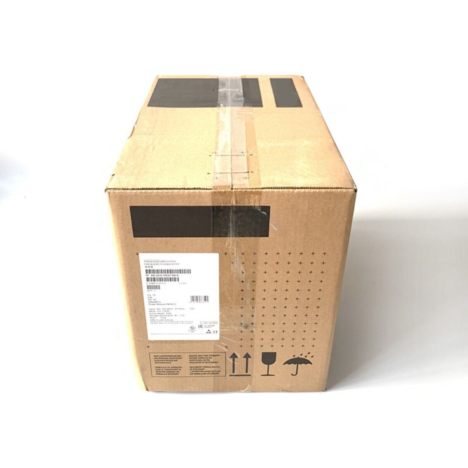 Siemens SINAMICS G120P frequency converter in cardboard packaging, shipping symbols visible.