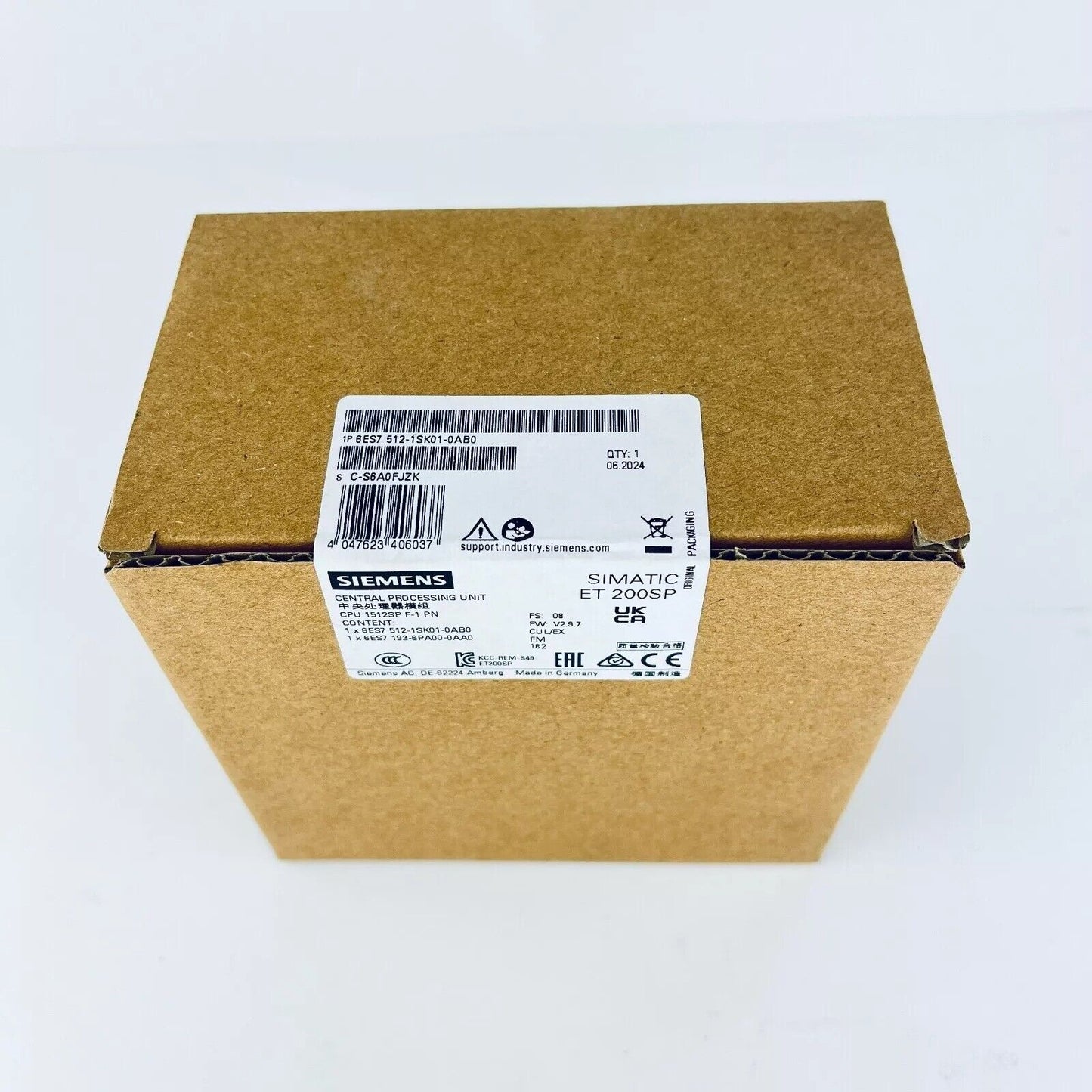 Siemens SIMATIC ET 200SP CPU 1512SP F-1 PN in original packaging, product label visible.