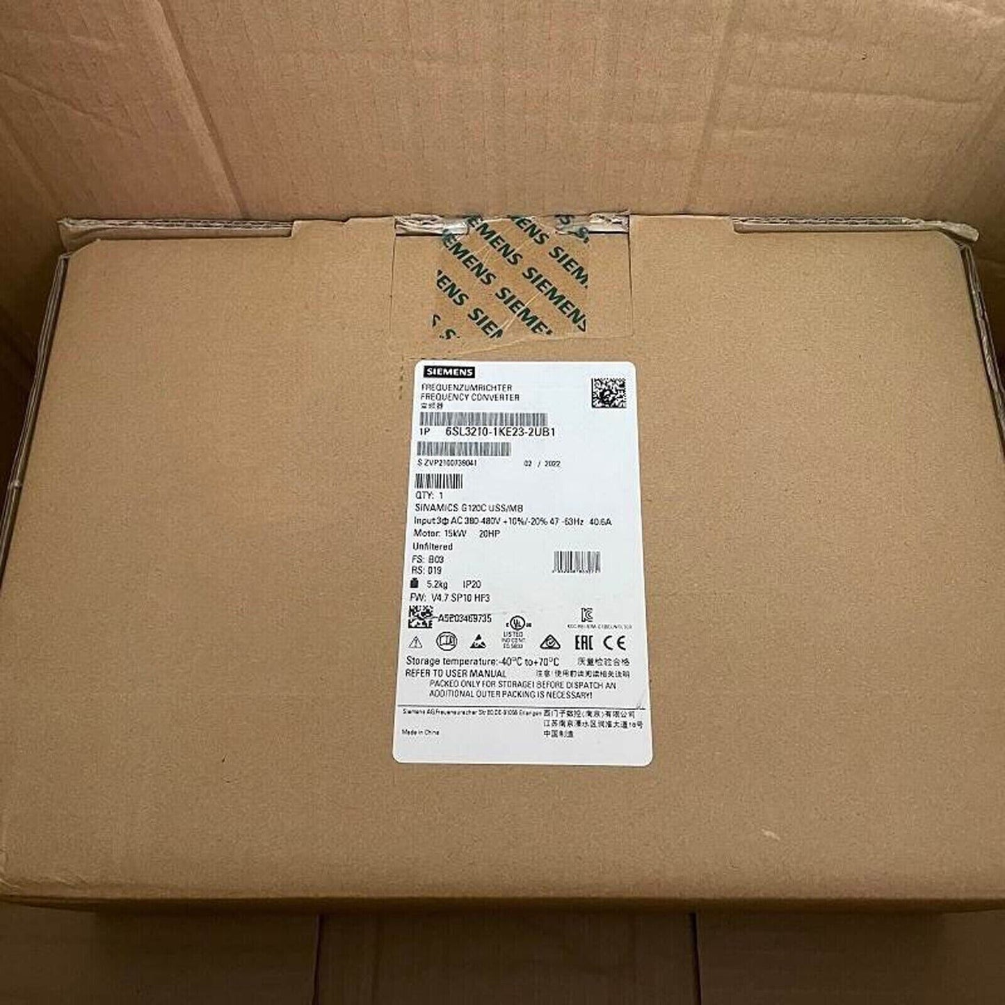 Siemens SINAMICS G120C Frequency Converter, 6SL3210-1KE23-2UB1, packaged in a brown box. Industrial automation component.
