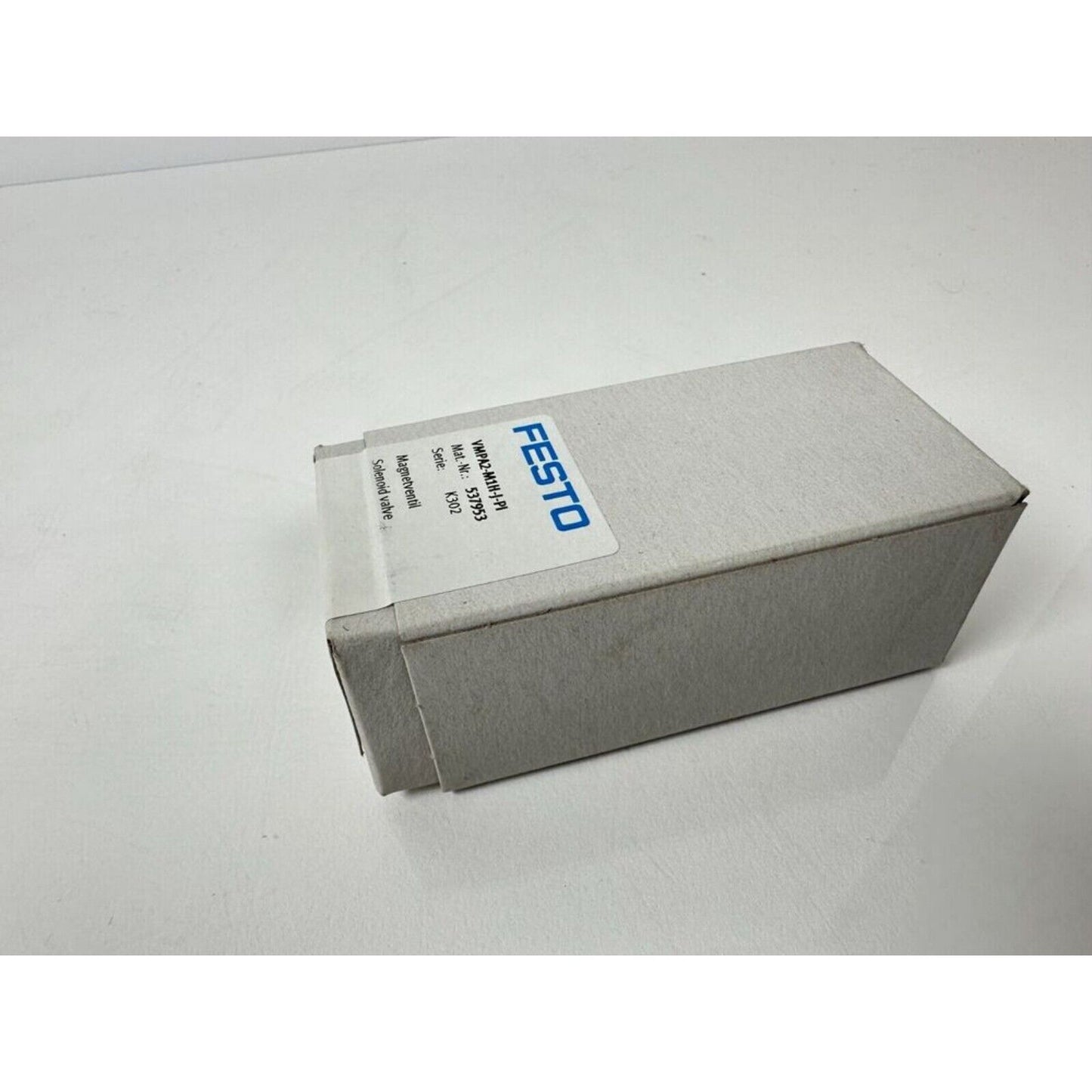 Festo VMPA2-M1H-J-PI Air Solenoid Valve in box. Industrial automation component with specifications visible.