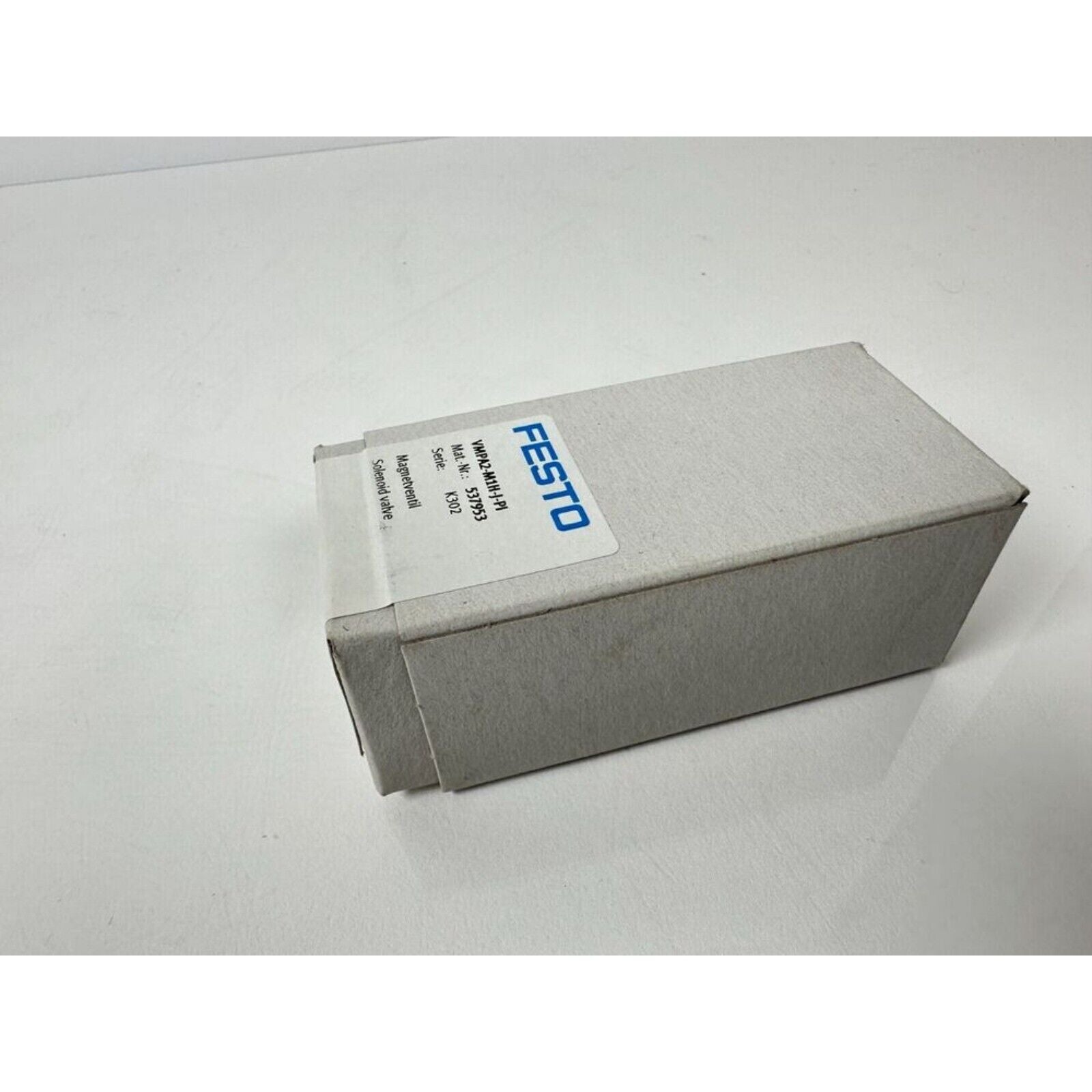 Festo VMPA2-M1H-J-PI Air Solenoid Valve in box. Industrial automation component with specifications visible.