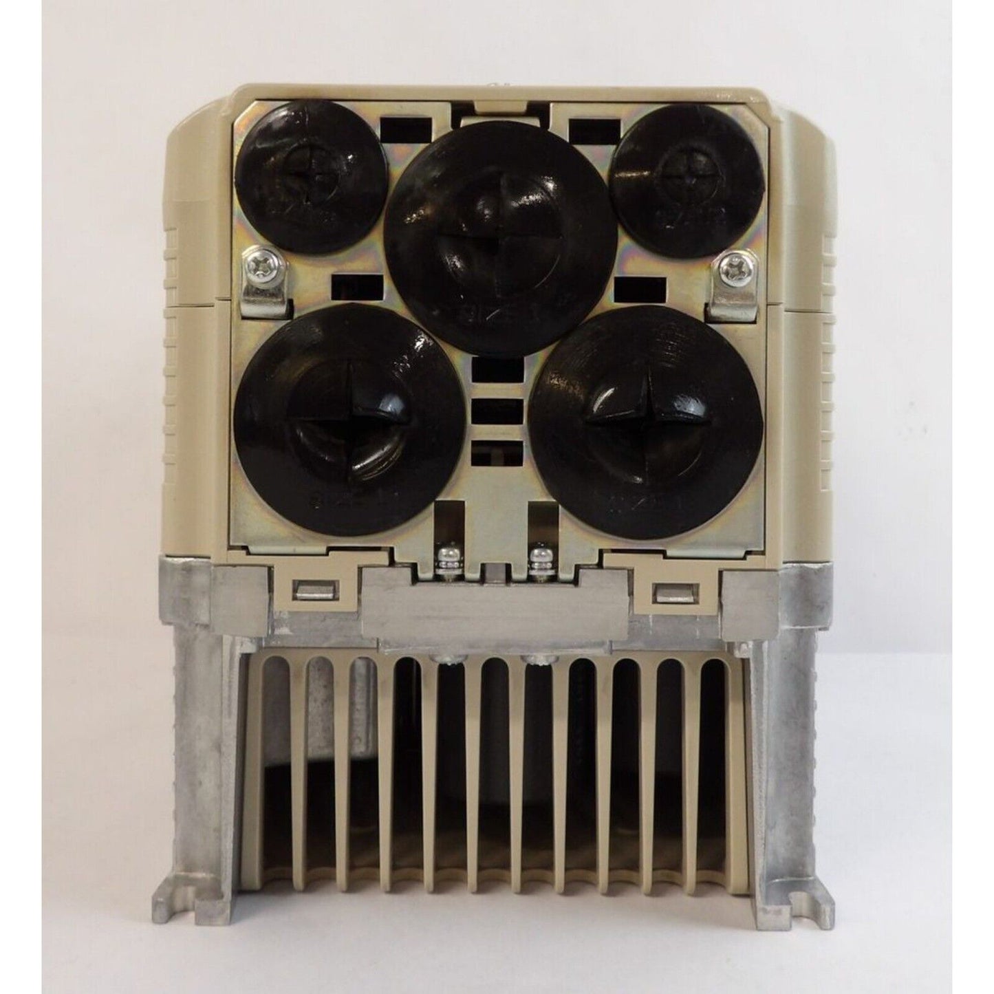 Yaskawa A1000 series AC drive. Beige and metal components with cooling fins, industrial automation spare part.