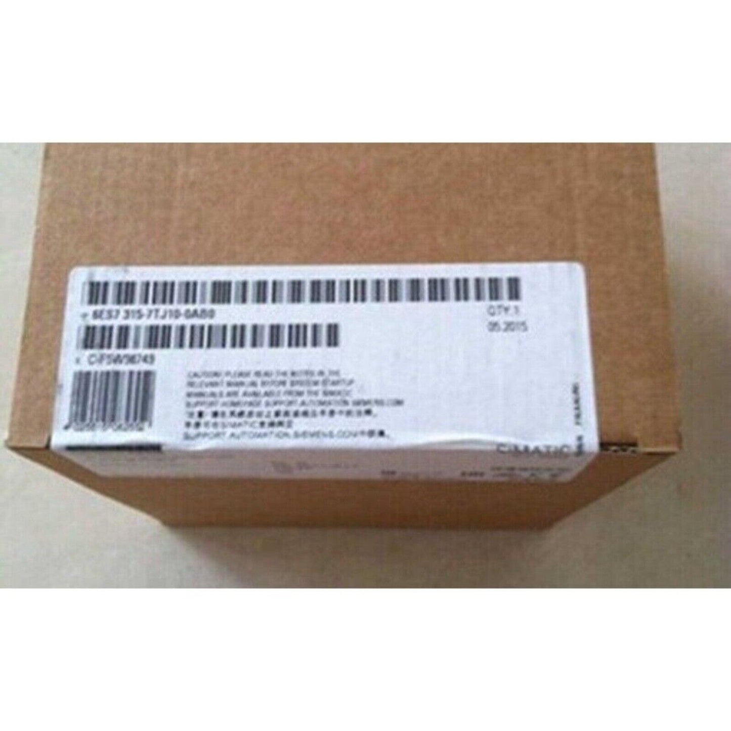 Siemens S7-300 PLC 6ES7 315-7TJ10-0AB0 in a brown cardboard box with label details, automation part.
