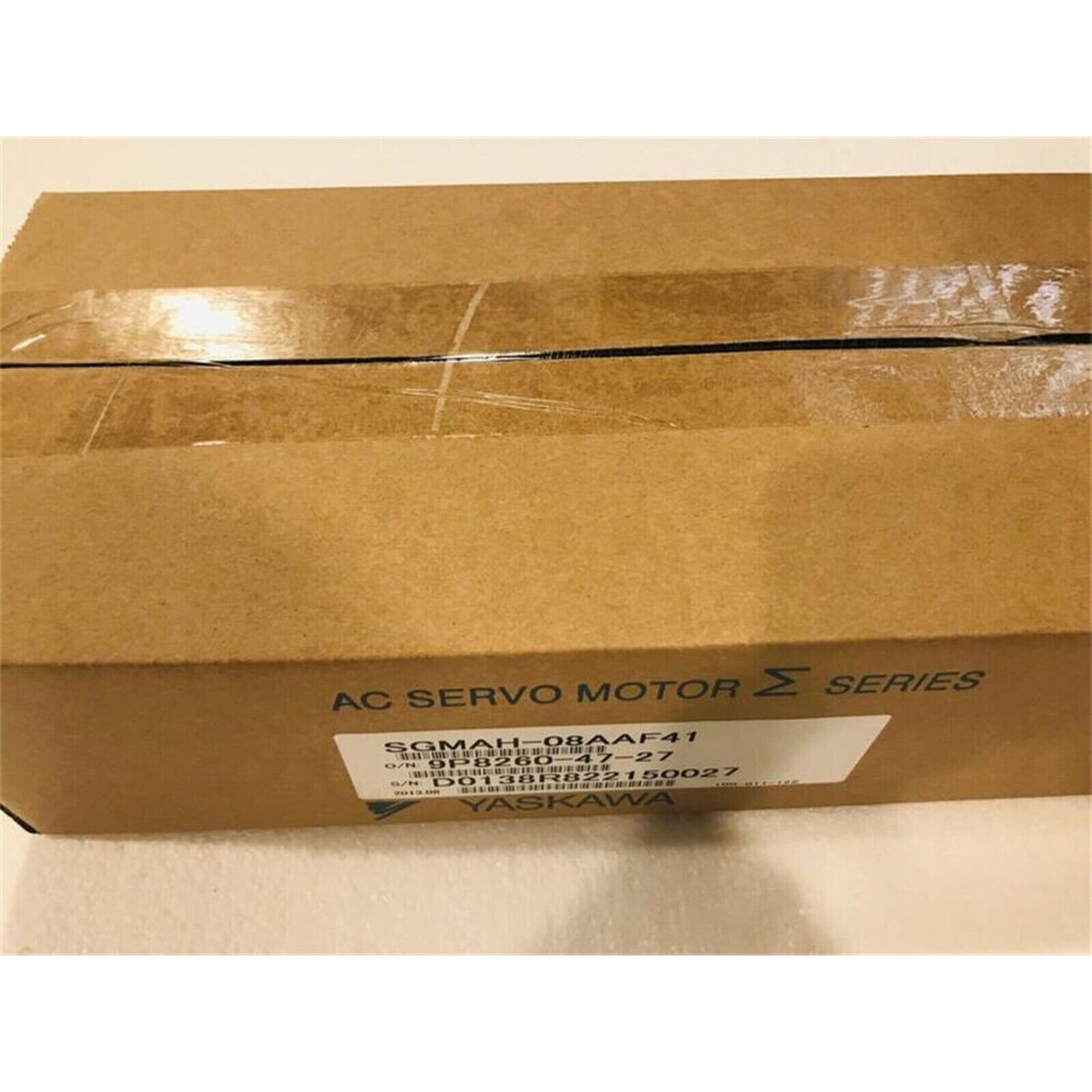 Yaskawa SGMAH-08AAF41 AC Servo Motor box. New servo motor packaging with model and serial information.