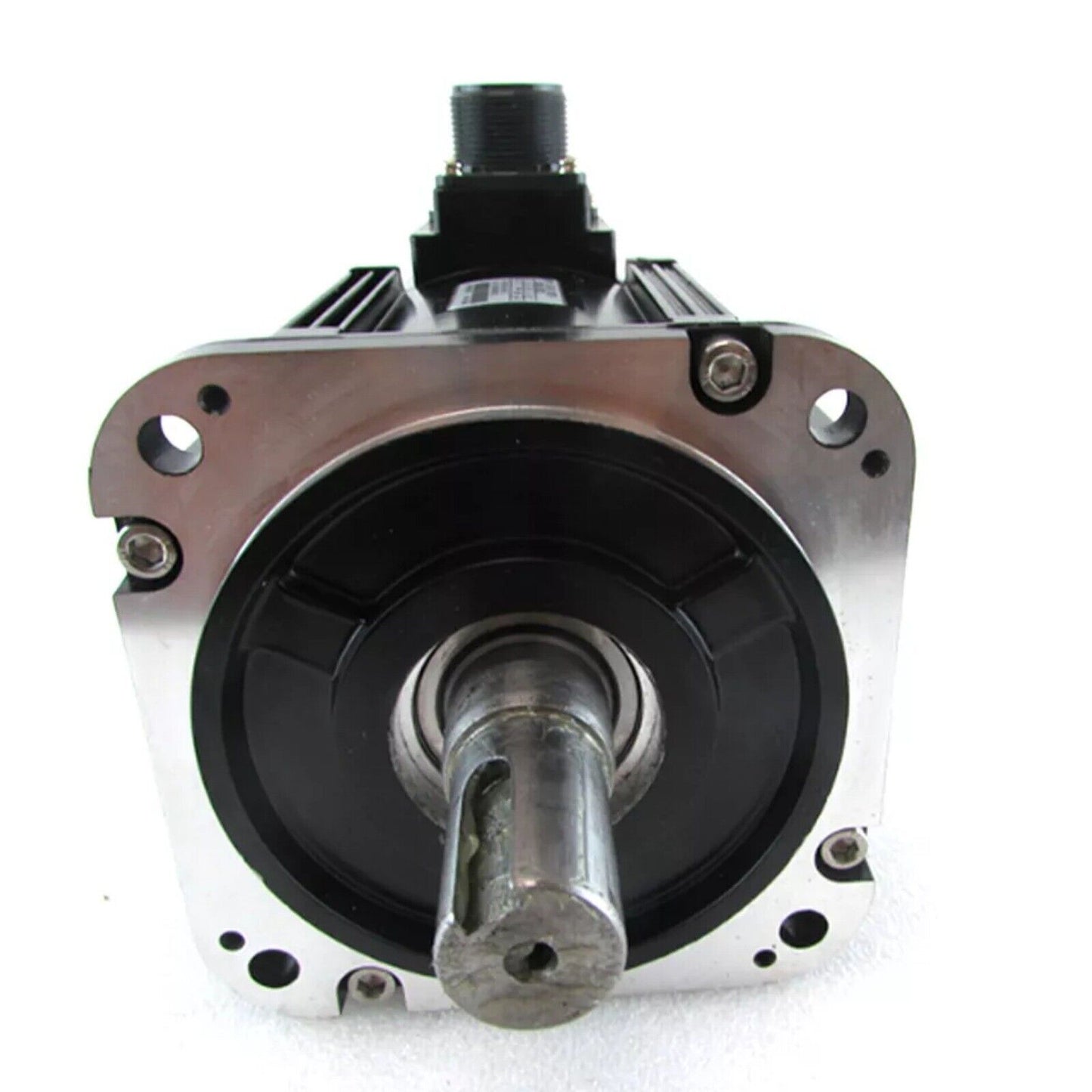 YASKAWA SGMG-13A2AB AC servo motor front view, industrial automation part, black and silver.