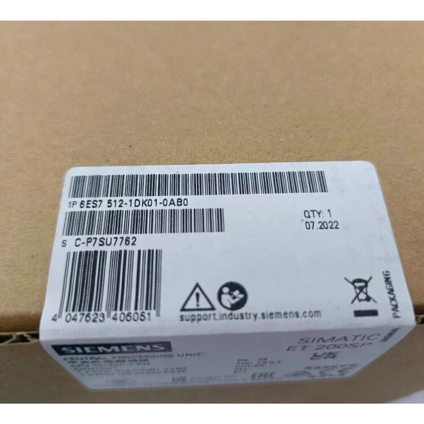 Siemens SIMATIC ET 200SP PLC CPU 6ES7 512-1DK01-0AB0 packaging, industrial automation part.