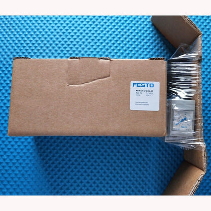 FESTO MS4-LR-1/4-D6-AS pressure regulator in cardboard box on blue background.