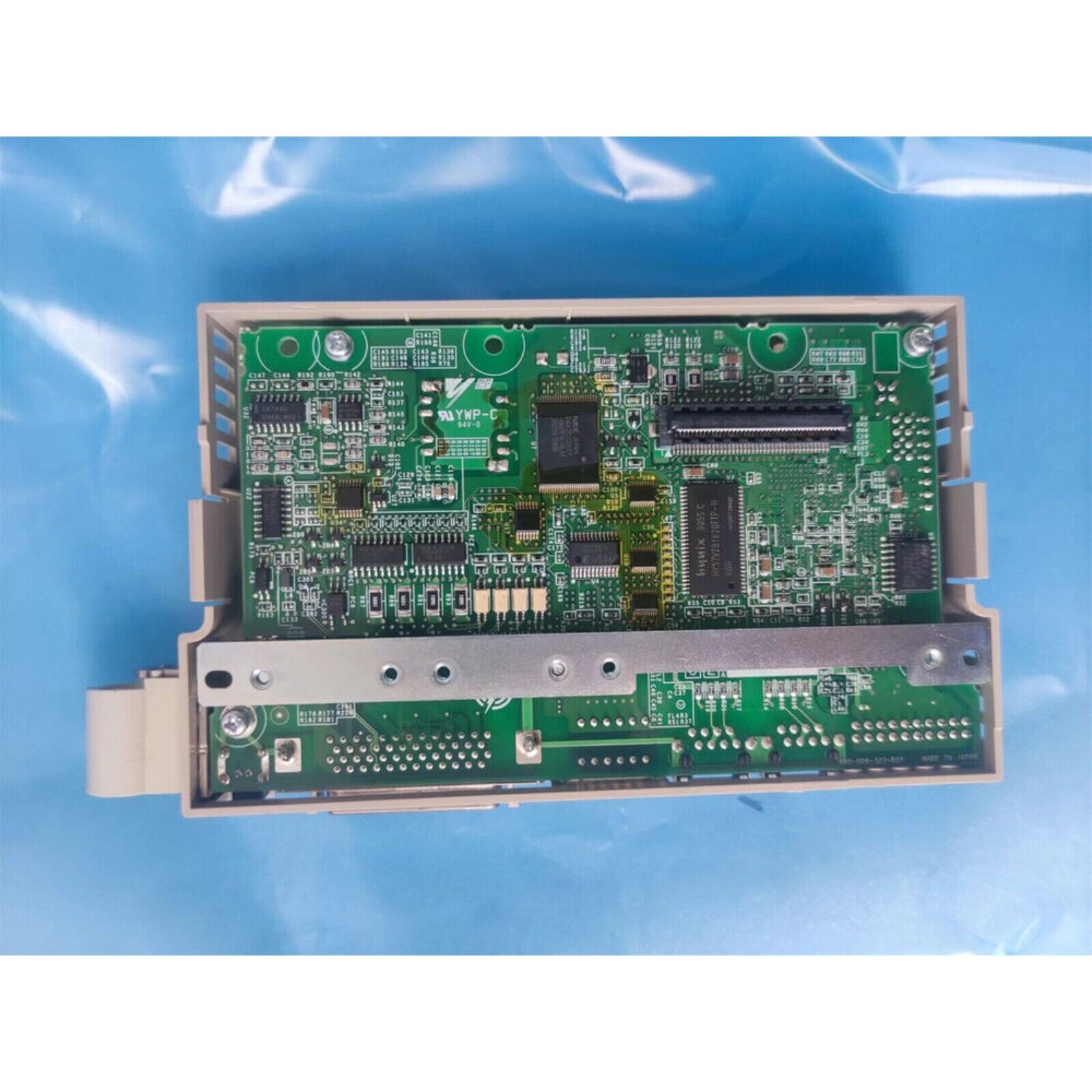 YASKAWA SGDV-0CC02A servo drive module. Electronic component, Made in Japan. Circuit board detail and model info.