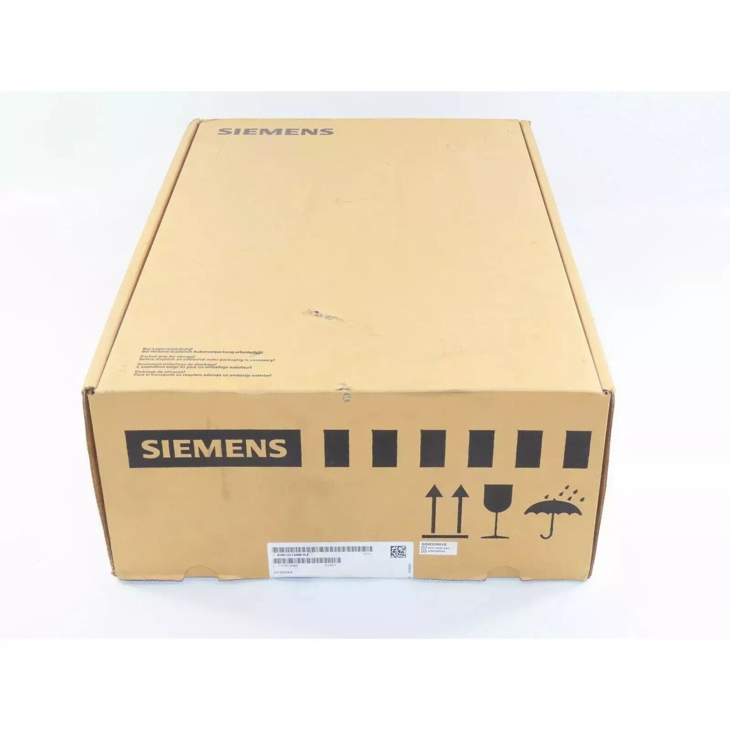 Siemens SIMODRIVE 611 Power Module box, industrial automation part, brown packaging with handling symbols.