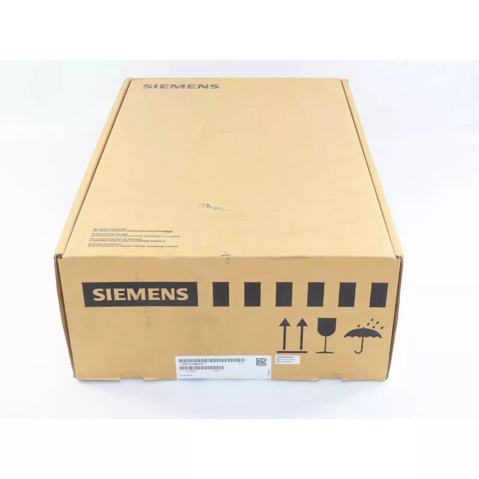 Siemens SIMODRIVE 611 Power Module box, industrial automation part, brown packaging with handling symbols.