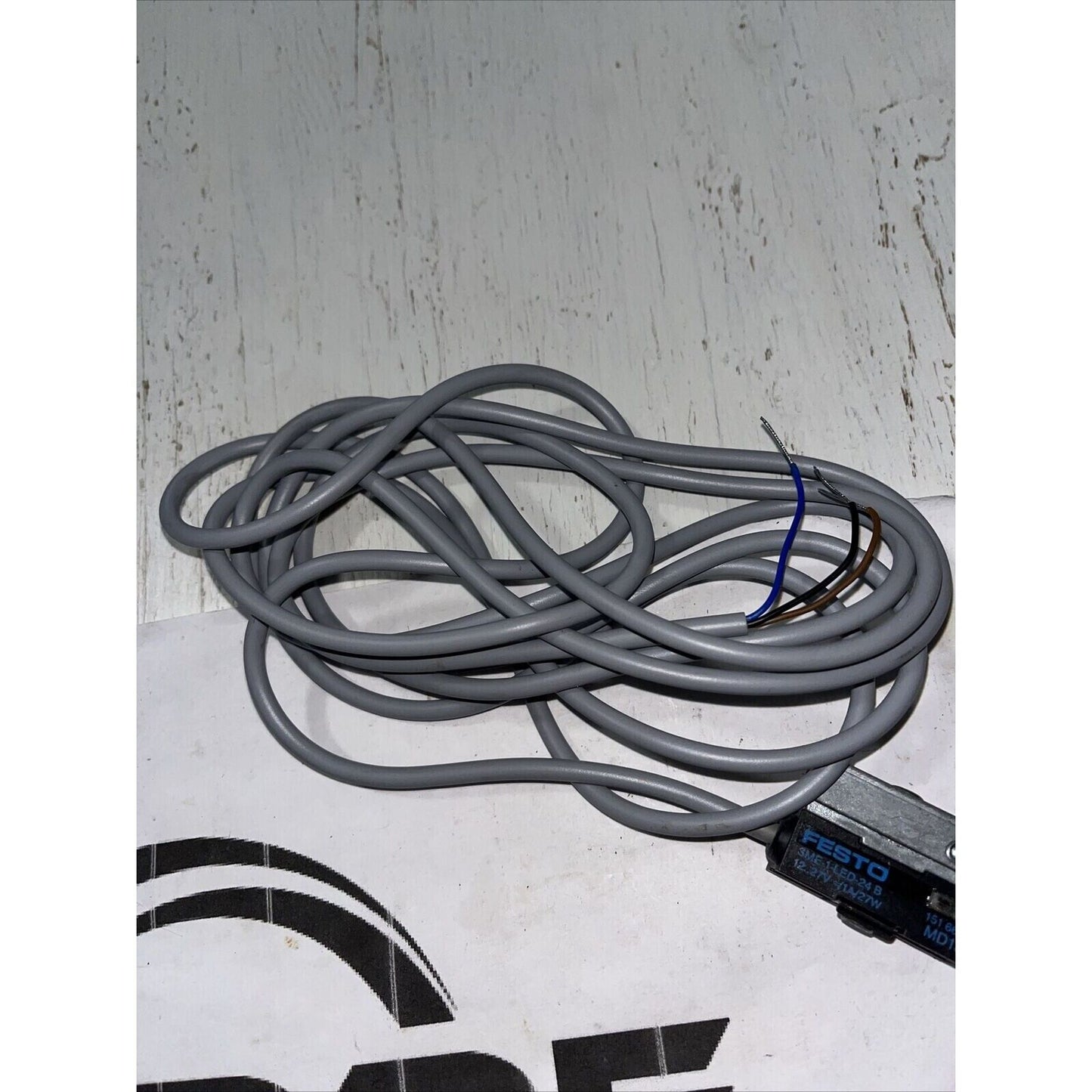 Festo SME-1-LED-24 B proximity sensor with gray cable, industrial automation component
