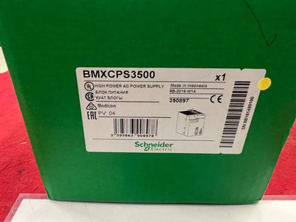 Schneider Electric BMXCPS3500 Power Supply Unit on a green box, industrial automation parts