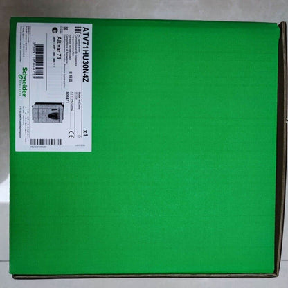 Schneider ATV71HU30N4Z frequency converter box, green and brown packaging, industrial automation equipment